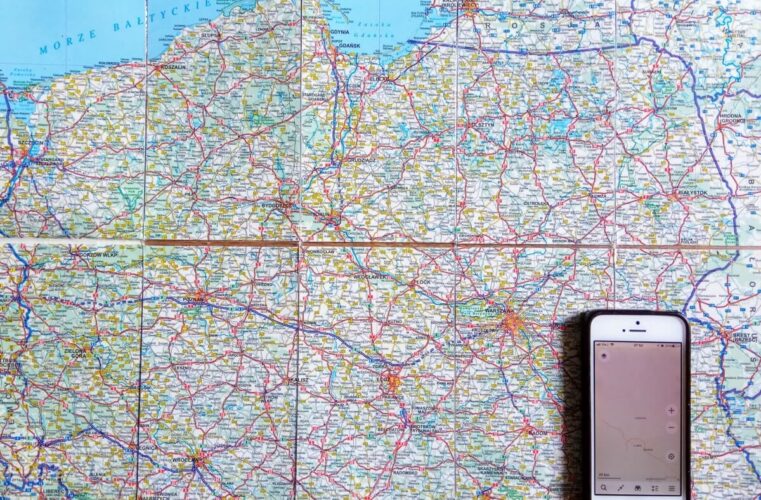 my pocket map of Poland with an overlay of the offline map on my phone adjusted to paper map's scale