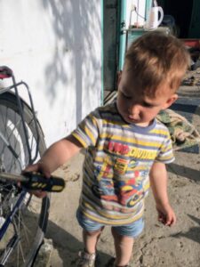 the boy David kept bringing me tools and parts from his father’s workshop while i made repairs on my bicycle
