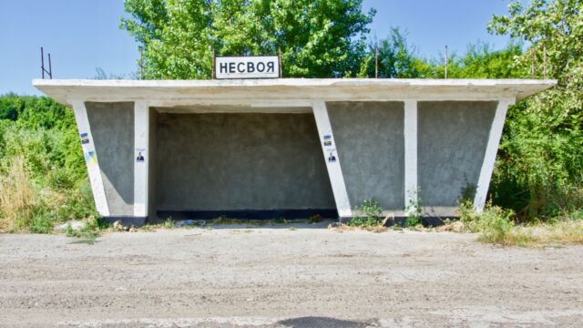 outside the 1980 Summer Olympics torch route, bus stops were mostly bare, except for some job notices, posters of candidates to Ukraine's upcoming parliamentary elections, and the occasional grafitti (Nesvoia/Nesfoaia)