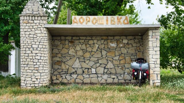 i didn't stop to photograph all of them, but i continued to notice bus stops along our way --- i believe this one was built (or at least renovated) in 2011, together with the Cossack sculptures frequently found (and dated) near them (Yampil District, Vinnytsia Region, Ukraine, Summer '19)