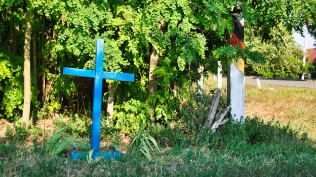 memorial to a fallen German soldier --- locals found the body and decided to give it a proper Christian burial --- Freudian slip or innocent act of compassion? (Ukraine, Summer '19)