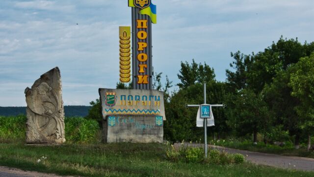 Apparently, they really want you to know that you're in Porohy, where a new marker was built right next to the old one --- notice also the Cossack and the cross --- this one was culturally overwhelming!